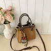 Bolso de hombro retro de nicho estilo coreano para mujer 2026, bolso cruzado de moda, bolso tote simple y elegante para el día a día y para ir al trabajo