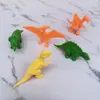 Plástico al por mayor Mini dinosaurio Modelo de dinosaurio Juguetes de goma blanda Máquina Gashapon Empujar contra el suelo Regalo Venta al por mayor