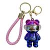 Llavero luminoso de oso mecánico punk colorido creativo electrochapado luz nocturna llavero colgante de bolsa regalo mayoreo