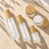 Tapa de Vidrio con Veta de Madera Botella Crema Mate Múltiples Especificaciones Botella con Atomizador Botella para Loción Tarro para Mascarilla Facial Botella de Relleno para Muestras de Cosméticos