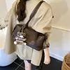 Bolso de hombro para mujer otoño e invierno 2026 nuevo moda coreana de moda bandolera versátil retro bolsa de almohada para debajo del brazo