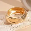 Pulsera Abierta Geométrica Asimétrica Ovalada Metálica Europea y Americana Elegante Exagerada de Nicho Joyería de Mano de Alta Gama para Mujeres