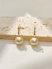 Pendientes colgantes de perlas para viajero de moda, de lujo ligero de alta gama, gancho para la oreja, diseño de nicho femenino