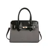 Bolso de mano de moda transfronterizo tipo Kelly para mujer, nuevo estilo verano 2026, bolso de nicho para el día a día, bolso de hombro y cruzado