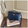 Bolso de mano de diseño de nicho de moda transfronterizo para mujer, nuevo, textura simple, bolso tipo caja, versátil para ir al trabajo, de un solo hombro, bandolera