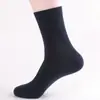 Calcetines otoño hombres desodorantes absorbentes de sudor transpirables Calcetines deportivos de media pantorrilla para hombre otoño e invierno engrosados calcetines de negocios calcetines de moda para todo