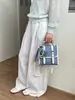 Mochila de Mezclilla Estilo Universitario de Diseño de Nicho para Mujer 2026 Nueva Moda Versátil Multiusos Bolso de Hombro Cruzado