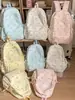 Mochila nueva de lunares estilo coreano para mujer 2026, mochila escolar ligera de gran capacidad para estudiantes, mochila linda de dibujos animados