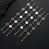 Pulsera Cruzada de Hip-Hop Europeo y Americano de Acero Inoxidable con Trébol de Cuatro Hojas para Mujer Cadena en Forma de O Joyería de Acero de Titanio Joyería de Diseño de Nicho Personalización de Joyería
