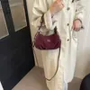 Bolso de Suede Retro para la Axila para Mujer 2025 Nuevo Otoño Moda Nicho Bolso de Hombro Bolso de Mano para Viajes