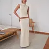 Conjunto de Tricô Sem Manga Transfronteiriço Estilo Europeu e Americano 2026 Primavera/Verão Novo Conjunto de Duas Peças: Top de Gola Redonda e Saia Longa de Cintura Alta