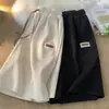 2024 Nuevos pantalones cortos casuales de seda de hielo de secado rápido para hombre, verano, delgados, holgados, con caída, modernos, bordados, rectos