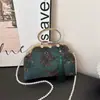 Bolsa Feminina Franja Imperatriz do Oeste Flor Bordada de Mão para Noite Outono/Inverno 2025 Bolsa Transversal de Ombro com Corrente de Pérolas