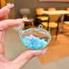 Cuentas de color copo de nieve azul paleta botella acrílica arenas movedizas luminosas venta al por mayor colgante creativo aceite Mickey accesorios