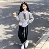 Conjunto de Dos Piezas de Dibujos Animados de Moda para Otoño y Primavera para Niñas Mayores: Sudadera con Retazos a Cuadros y Pantalones Casuales de Pierna Ancha