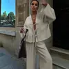 Otoño 2025 Nuevo Conjunto Casual de Dos Piezas de Color Sólido Moda Estilo Europeo y Americano Traje de Pantalón y Camisa con Cordones de Alta Gama Para Mujer
