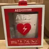Venta al por mayor del fabricante Desfibrilador AED de seguridad Portátil para el hogar y el coche Máquina de entrenamiento de primeros auxilios AED Simulador AED