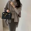 Capa tipo abrigo de punto casual y suave de Dongdaemun, Corea, para mujer, hecha de cachemira, capa cárdigan