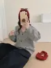 Chaqueta suéter de punto a rayas de color contrastante con cuello en V estilo coreano, nuevo cárdigan de punto versátil de ajuste holgado para mujer, otoño e invierno 2026