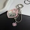Cadena de teléfono de hueso de serpiente de espejo acrílico simple y fresca, llavero versátil creativo colgante de bolso cadena de hueso de serpiente