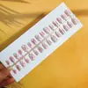30 piezas de uñas postizas de press-on hechas a mano con diseño de lazo de lunares rosa nude, puntas de uñas postizas al por mayor para salones de uñas