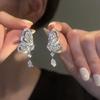 Design de brincos de tarraxa borboleta de nicho de luxo leve 2023 outono e inverno Novos brincos simples de gota d'água com diamantes completos para mulheres