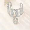 Set de Dos Piezas de Pulseras y Anillos Geométricos Huecos Creativos Personalizados, Joyería Set, Superventas Transfronteriza Versátil para el Uso Diario
