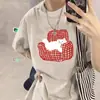 Camiseta de algodón puro estilo retro americano de manga corta para mujer, nuevo diseño de verano 2026, estilo estudiante, top holgado e informal de media manga