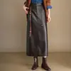 Falda de cuero PU de cintura alta de moda con abertura para mujer, nuevo estilo coreano otoño 2026, falda versátil de longitud media ajustada al cuerpo