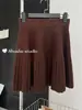Falda de punto gris plisada estilo francés para mujer, nuevo modelo otoño/invierno 2026, versátil, rejuvenecedora, adelgazante, de cintura alta, línea A, corta