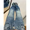 Jeans feminino de cintura baixa, levemente flare, com efeito levanta bumbum, nova coleção verão e outono 2026, estilo retro americano, lavado e tie-dye, corte que emagrece