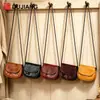 Bolso cruzado pequeño de piel de vaca de primera capa, monedero vintage transfronterizo, organizador de auriculares y lápiz labial, bolso para teléfono multifuncional