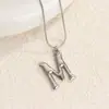 Nuevas 26 letras acero de titanio sin decoloración transfronterizo lujo ligero tendencia minimalista punk hip-hop Amazon collar femenino fabricantes