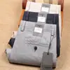 Pantalones casuales de lino nuevos de primavera para hombre, verano, material fino de algodón y lino, absorbentes de sudor, transpirables, rectos, elásticos, pantalones de vestir para hombre