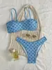 2026 Novo Biquíni Popular Estampado Triângulo Bojo Amarrar Duas Peças Moda Praia Europeu e Americano Ins Moda Praia Águas Termais