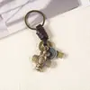 Llavero creativo para hombres y mujeres, pequeño regalo, aleación, lindo animal de aleación, llavero de cuero tejido vintage, llavero