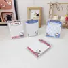 Nuevo producto creativo: Bloc de notas con portapapeles de la serie de dibujos animados Hello Kitty con lindos diseños de personajes, portátil y conveniente para que lo usen los estudiantes