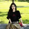Atacado do fabricante de novas camisetas femininas de manga curta de comércio exterior, camisetas femininas de manga curta de verão estilo americano estampadas marca da moda itens quentes de vendas transfronteiriças