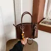 Bolso de nicho transfronterizo para mujer, nuevo bolso de hombro tipo cubo retro de moda 2026, bolso cruzado para el día a día