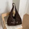 Bolsa de Mão Estampa de Leopardo Feminina 2026 Nova Outono Estilo Preguiçoso Casual Escola Trabalho Bolsa Tote Grande Capacidade Bolsa de Ombro