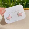 Brincos de Pérola Versáteis Simples Borboleta 2026 Novos Brincos Populares para Mulheres com Design Elegante de Nicho e Sensação de Luxo