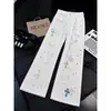 Pantalones Vaqueros Blancos Frescos de Gama Alta para Hombre Verano Delgados con Salpicaduras de Pintura Estilo Americano High Street Micro Acampanados Paracaídas Cargo