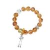 Diseño original pulsera de cristal torre amarilla pulsera de cristal amarillo libro rojo pequeño cuerda de mano que tiembla suministro al por mayor