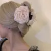 Nuevo modelo 2026 pinza para el pelo floral para la parte trasera de la cabeza, elegante y adecuada para vacaciones en la playa, accesorio versátil para el cabello