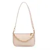 Bolso de mano, bolso cruzado de hombro de nicho, bolso de axila, bolso baguette de cuero genuino, bolso versátil de alta gama para mujer