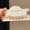 Pulsera de Trébol de la Suerte Hueca Electrochapada en Oro Real de 18K con Circonita, Pulsera Exquisita de Nicho de Lujo Ligero con un Toque de Alta Gama y Diseño Versátil