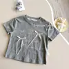 Camiseta de manga corta para niñas, nuevo estilo de verano 2026, camiseta con estampado de dibujos animados para niñas, absorbente de sudor, transpirable, agradable para la piel, moderna