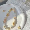 Cachorrinho de cerâmica original feito à mão estilo ins cerâmica creme feito à mão DIY corrente de celular com contas corrente ccd pingente