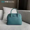 Bolso de mano para mujer, primavera y verano 2023, de piel auténtica, sencillo, moderno, informal, retro, portátil.