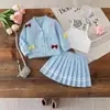 Conjunto de Tres Piezas para Niña Estilo Coreano Academia con Cardigan de Nudo de Lazo Color Sólido y Falda Plisada Línea A 2025